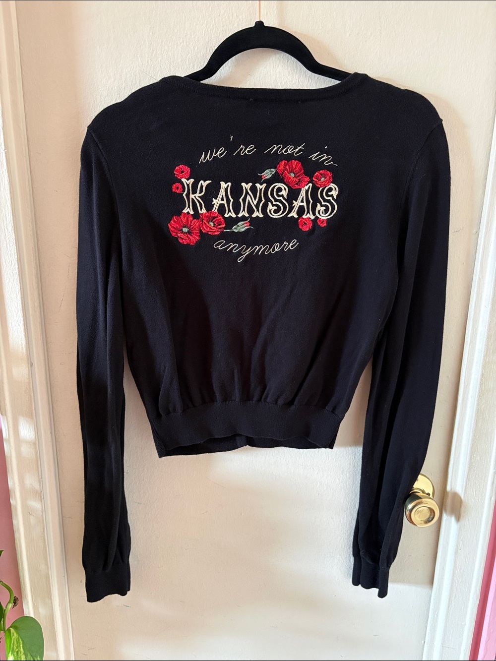 Dolls Kill x Wizard of Oz “We’re Not in Kansas Anymore” Black Cardigan Sweater
